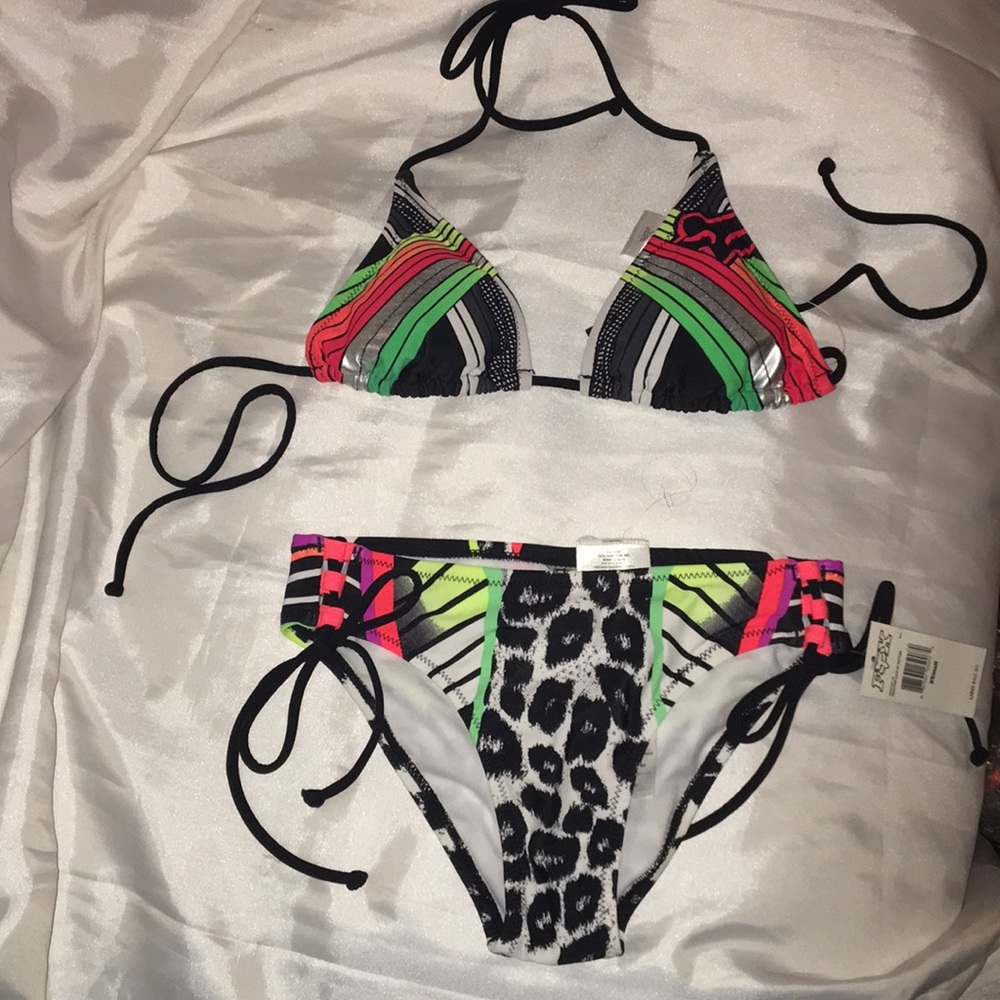 NWT TWISTED TRIANGLE TOP , FRACTION LACE UP BOTTOM